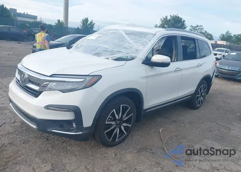 2020 Honda Pilot Awd Touring 8 Passenger from USA, damaged, VIN 5FNYF6H90LB031620